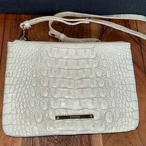 Slim authentic Brahmin crossbody. Cream. Adjustable straps.